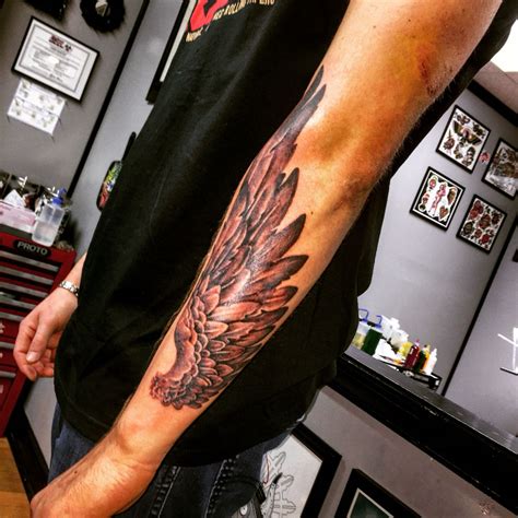 tattoo with angels|angel wings forearm tattoo.